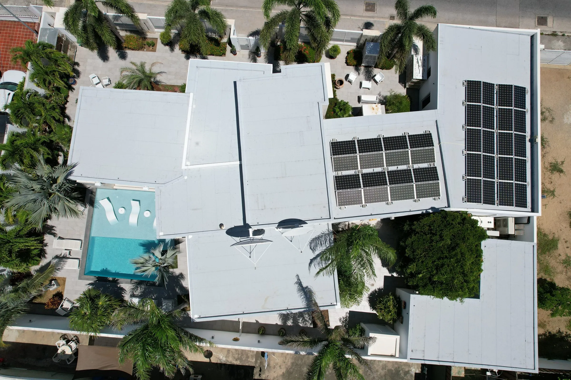 White flat roofs with solar panels